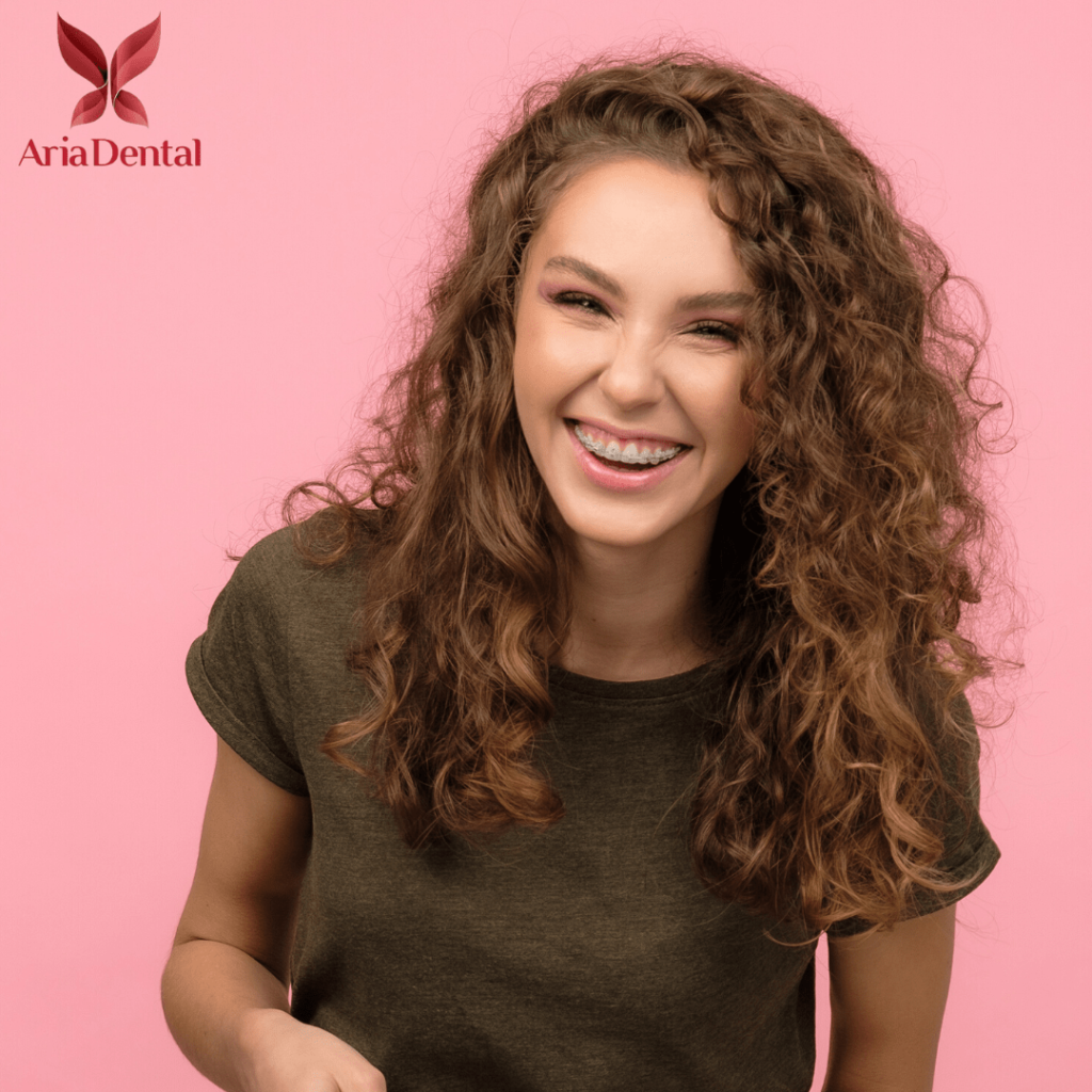 curly brown hair woman smiling