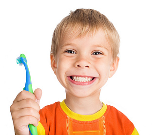 What kind of toothbrush and toothpaste should my child use?