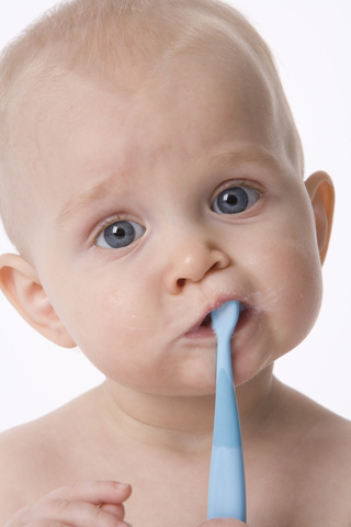 when can babies brush teeth
