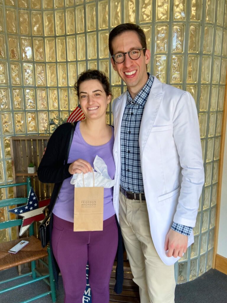 Dr. Aronson and happy braces patient