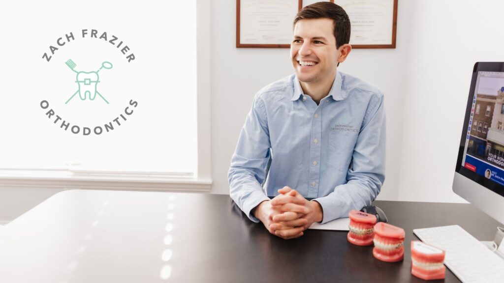 Dr. Zach Frazier sitting at desk