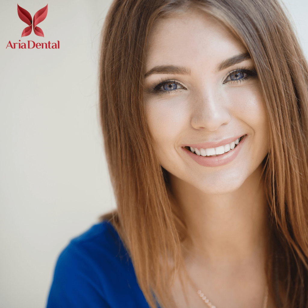 woman smiling at dental office