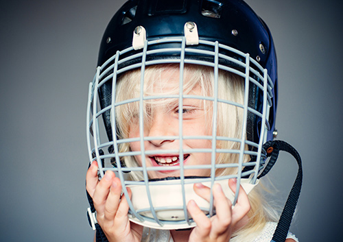 A young boy is celebrating National Facial Protection Month in Worcester & Central, MA.