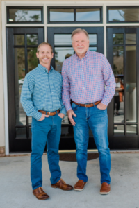 Local orthodontists in Valdosta, GA standing outside of their location.