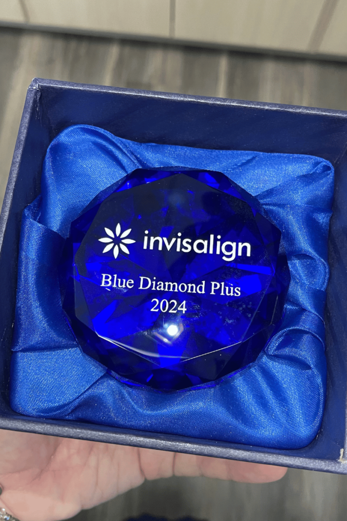 DR. Greg Morris receiving Blue Diamond Plus from Invisalign