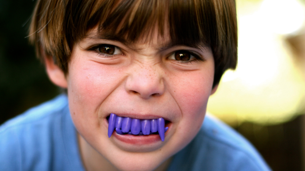 kid with candy teeth