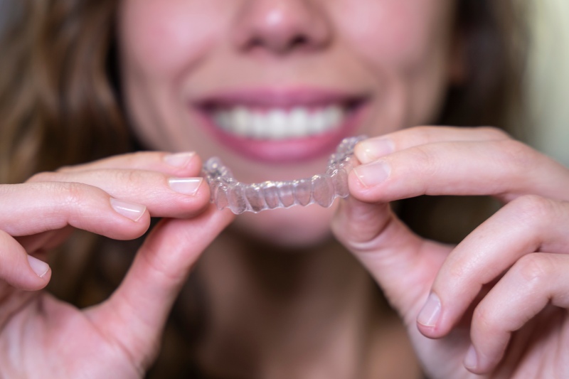 A woman chooses Invisalign for adults